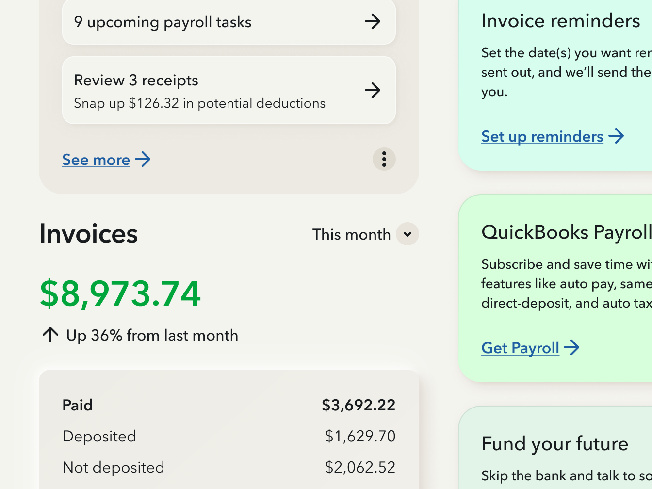 Close-up of the redesigned dashboard: an Invoices widget showing $8,973.74, up 36% from last month, beside soft-colored cards for invoice reminders and QuickBooks Payroll.